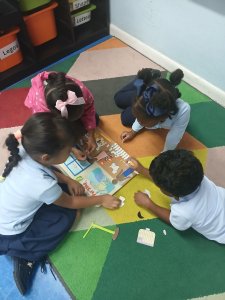Children making group art