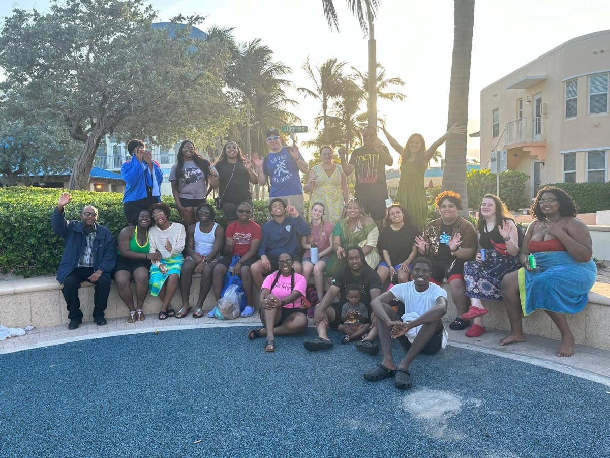 Photograph for story: Beach Fellowship With Praying Pelicans